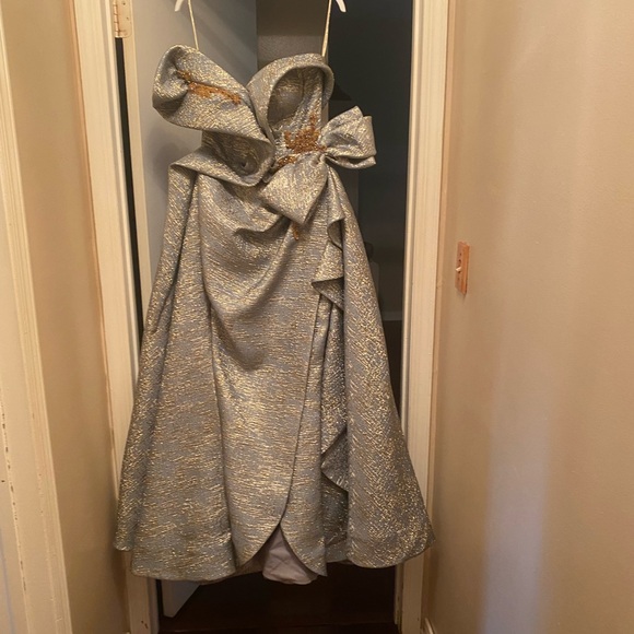 Blue $990
STYLE 2466
Gorgeous elegant dress received many compliment - Picture 6 of 16